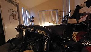 dummy doll teases with a sneaky suck in boots and catsuit