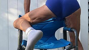 deep pelvic stretching in blue briefs on blue chair late october 2024