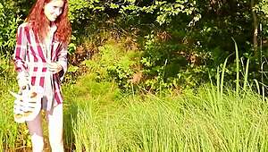 Petite Cute Redhead Beauty Goes Nude Outdoor by Lake Flashing Natural Tits Publicly