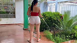 horny latina stepmom waters plants in shorts shaking her huge ass slutty
