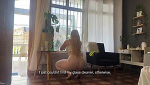 woman cleans window wearing see-through pants revealing hairy pussy and ass
