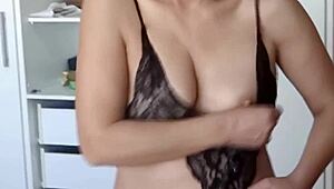 Beautiful stepmother tries new lingerie flashing huge tits and curvy ass