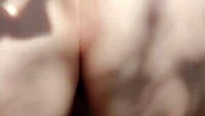 mature blonde cougar spreads huge shaved pussy lips in secret outdoor garden flashing