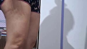 A husband films his wife washing the floor in sexy leg tease brazilian style