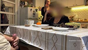 my husband jerks under table in front of stepmom and me in kitchen