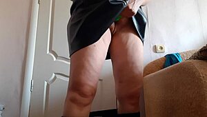 watch this milf secretary in leather skirt vibe her pussy at work