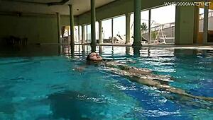 Diana Rius's juicy latina tits glisten as she gropes underwater in bikini