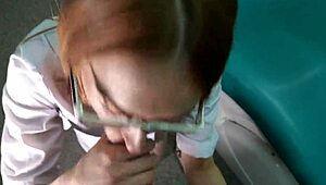 glasses doctor kneels sucking patient's cock for facial cumshot
