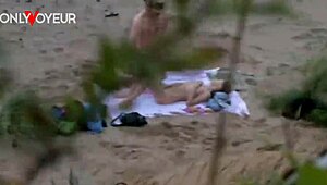 damn i caught this teen couple on the beach fingering each other passionately naked voyeur style