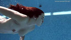 Diana Rius's juicy latina tits glisten as she gropes underwater in bikini