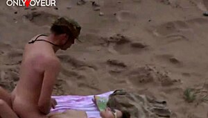 damn i caught this teen couple on the beach fingering each other passionately naked voyeur style