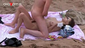 damn i caught this teen couple on the beach fingering each other passionately naked voyeur style