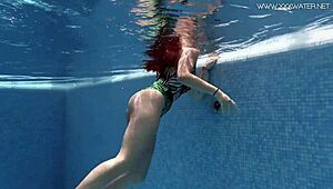 Diana Rius's juicy latina tits glisten as she gropes underwater in bikini