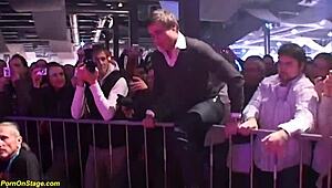 hey, you gotta see this wild babe strapon fucking on public stage with ripped clothes