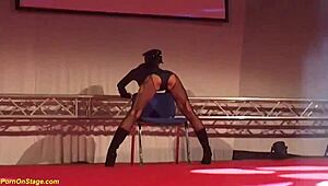 hey, you gotta see this wild babe strapon fucking on public stage with ripped clothes