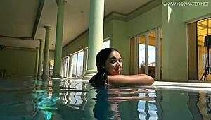 Diana Rius's juicy latina tits glisten as she gropes underwater in bikini