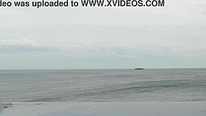 skinny japanese college girl in ponytail dips into infinity pool showing off legs and small waist