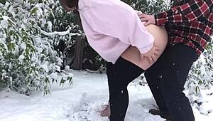 real couple braves the snowy outdoors in tight leggings for intimate fun