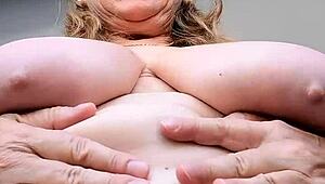 Busty granny spreads shaved pussy close-up masturbating hungrily