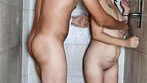 Horny tattooed milf gets golden shower piss in nightclub bathroom after bdsm dance!