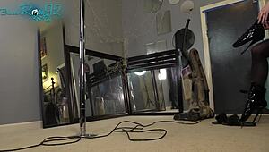 Housewife vacuums seductively in tight hobble boots