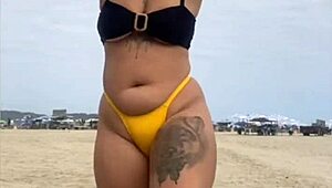 Tight Yellow Bikini Splits Swollen Pussy on Beach