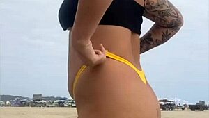 Tight Yellow Bikini Splits Swollen Pussy on Beach