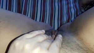 Innocent hairy pussy throbs with wet clit masturbation while parents work unaware