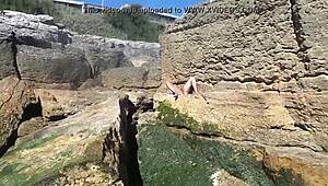 African Prostitute Flaunts Bueno Culo on Nudist Beach