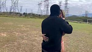 Naked wife jerks off in field then offers tight asshole bare on soccer pitch