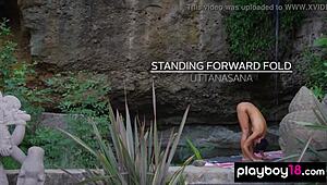 Watch naked milf yoga instructor Daniella Smith stretch trimmed pussy outdoors