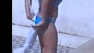 Hey, you watching me film my sexy Brazilian friend rip her clothes off in this steamy striptease? Check my blog for way more hot lesbian action like this