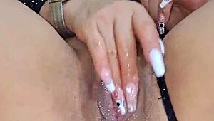 Sexy latina fingers pussy with dildo vibrator till squirting orgasm in solo show.