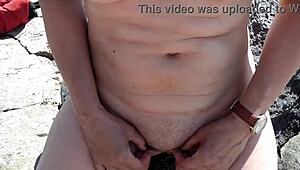 Housewife unleashes piss and spunk right on public beach