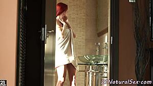 euro redhead babe fingers herself sensually in steamy shower