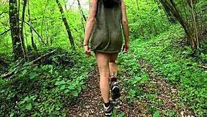 Beautiful european brunette babe strips naked showing perfect ass walking through woods outdoors