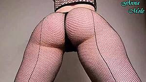damn this pawg in fishnets spanks her juicy ass then rides dildo hard til dripping wet