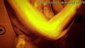 sexy milf shakes wet tits nipples hard in slow mo shower
