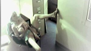 The busty blonde office slut sneaks toys into her pussy for a solo masturbation thrill on hidden cam