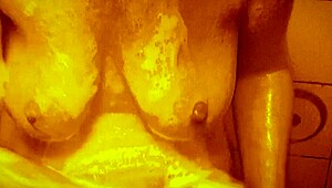 sexy milf shakes wet tits nipples hard in slow mo shower