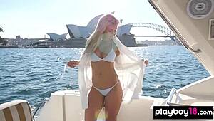 petite blonde teen jessica nelson strips naked outdoors on yacht revealing her big tits and pussy
