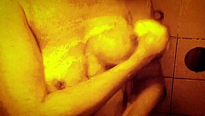 sexy milf shakes wet tits nipples hard in slow mo shower