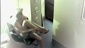 The busty blonde office slut sneaks toys into her pussy for a solo masturbation thrill on hidden cam