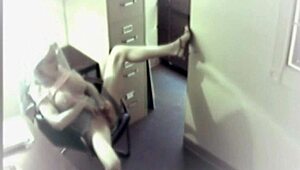 The busty blonde office slut sneaks toys into her pussy for a solo masturbation thrill on hidden cam
