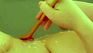 closeup pussy filled dripping with fresh creampie cum oozing out slow