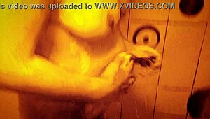 sexy milf shakes wet tits nipples hard in slow mo shower