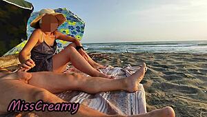 french teacher slurps huge bull cock on nudist beach with risky public voyeurs