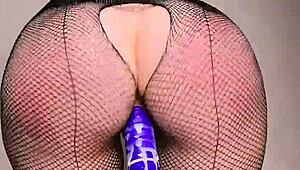 damn this pawg in fishnets spanks her juicy ass then rides dildo hard til dripping wet
