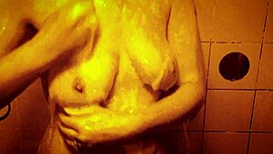 sexy milf shakes wet tits nipples hard in slow mo shower