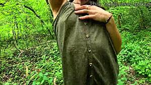 Beautiful european brunette babe strips naked showing perfect ass walking through woods outdoors